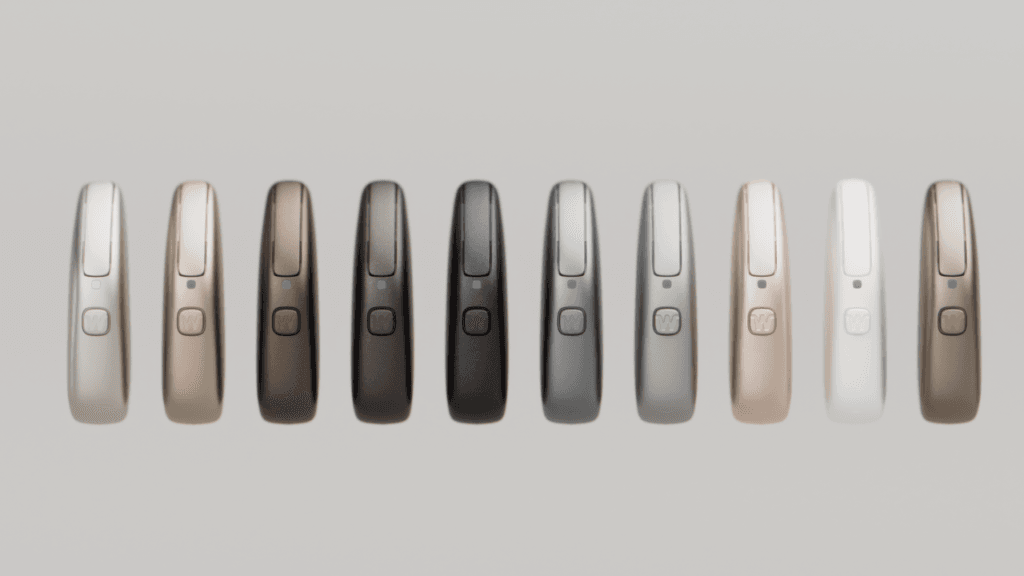 Widex Allure Hearing Aids in 10 different colours set in a horizontal line.