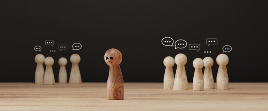A dice left alone and being laughed at.